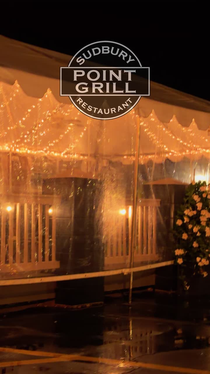 The patio after dark · Sudbury Point Grill